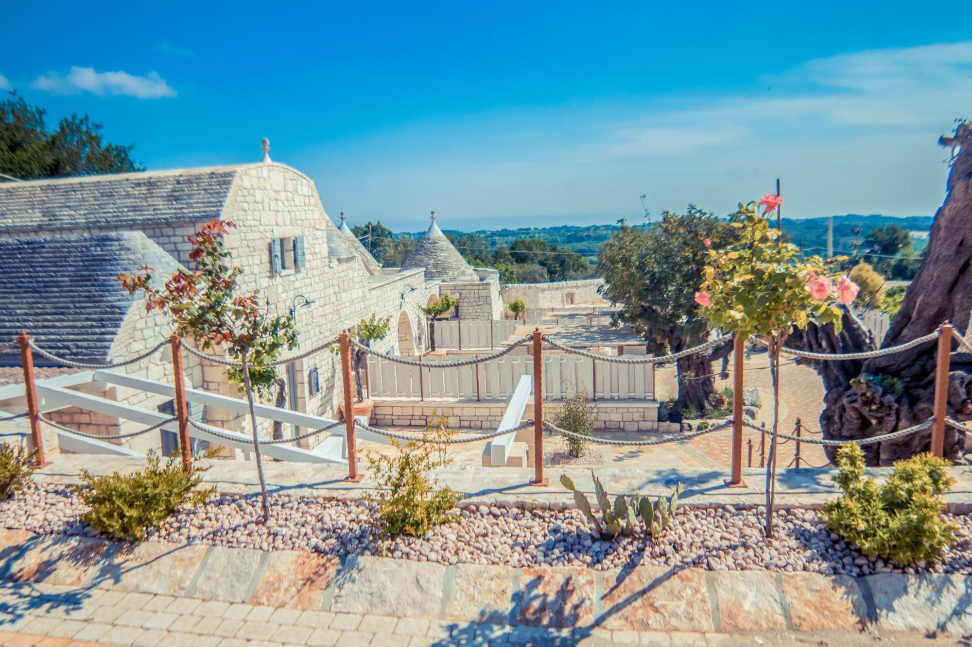 ロコロトンド Navolte Trulli E Quiete Con Piscinaヴィラ エクステリア 写真