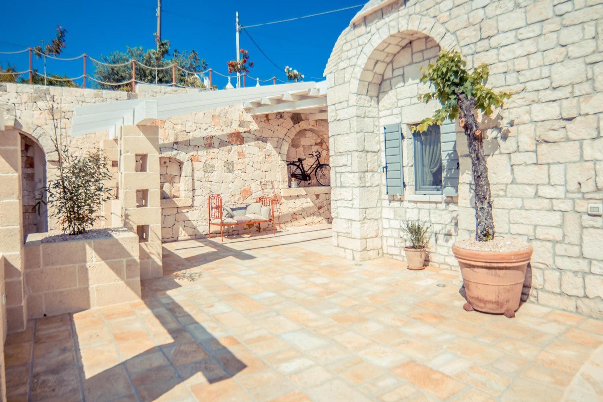ロコロトンド Navolte Trulli E Quiete Con Piscinaヴィラ エクステリア 写真