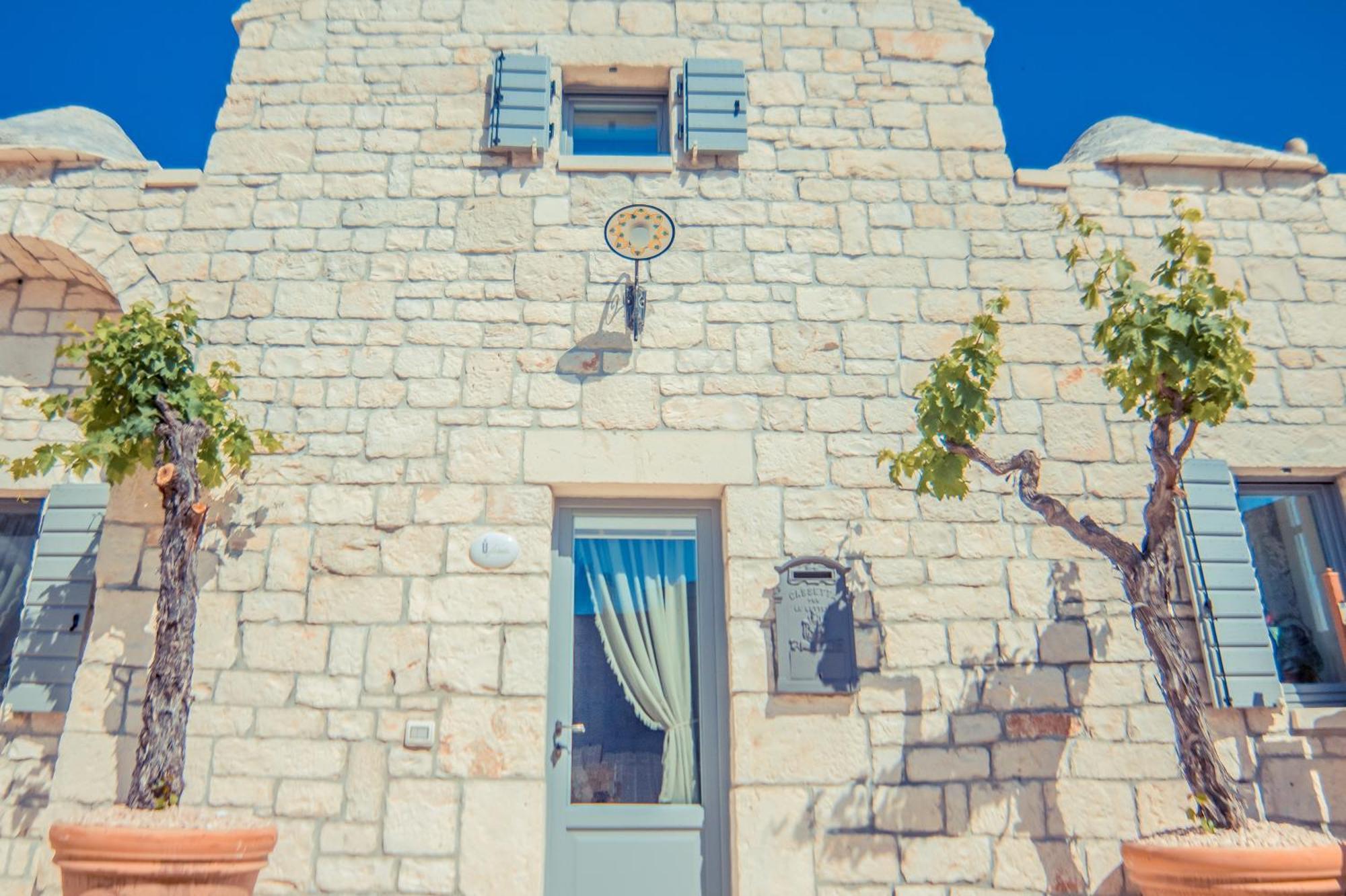 ロコロトンド Navolte Trulli E Quiete Con Piscinaヴィラ エクステリア 写真